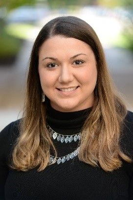 Smiling woman with long brown hair