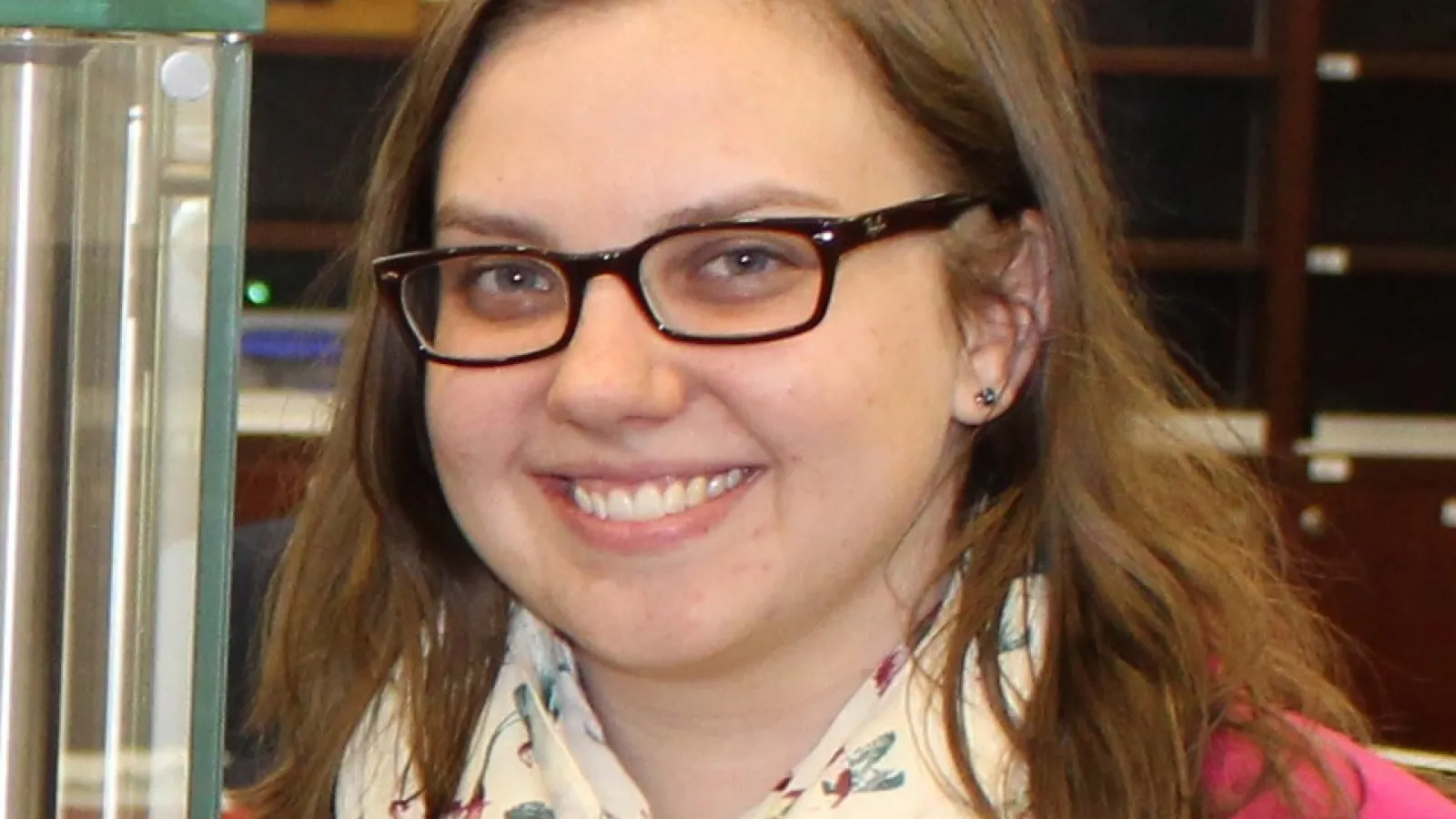 Smiling woman with light brown hair