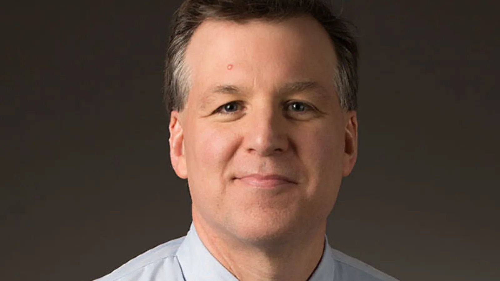 Smiling short haired man