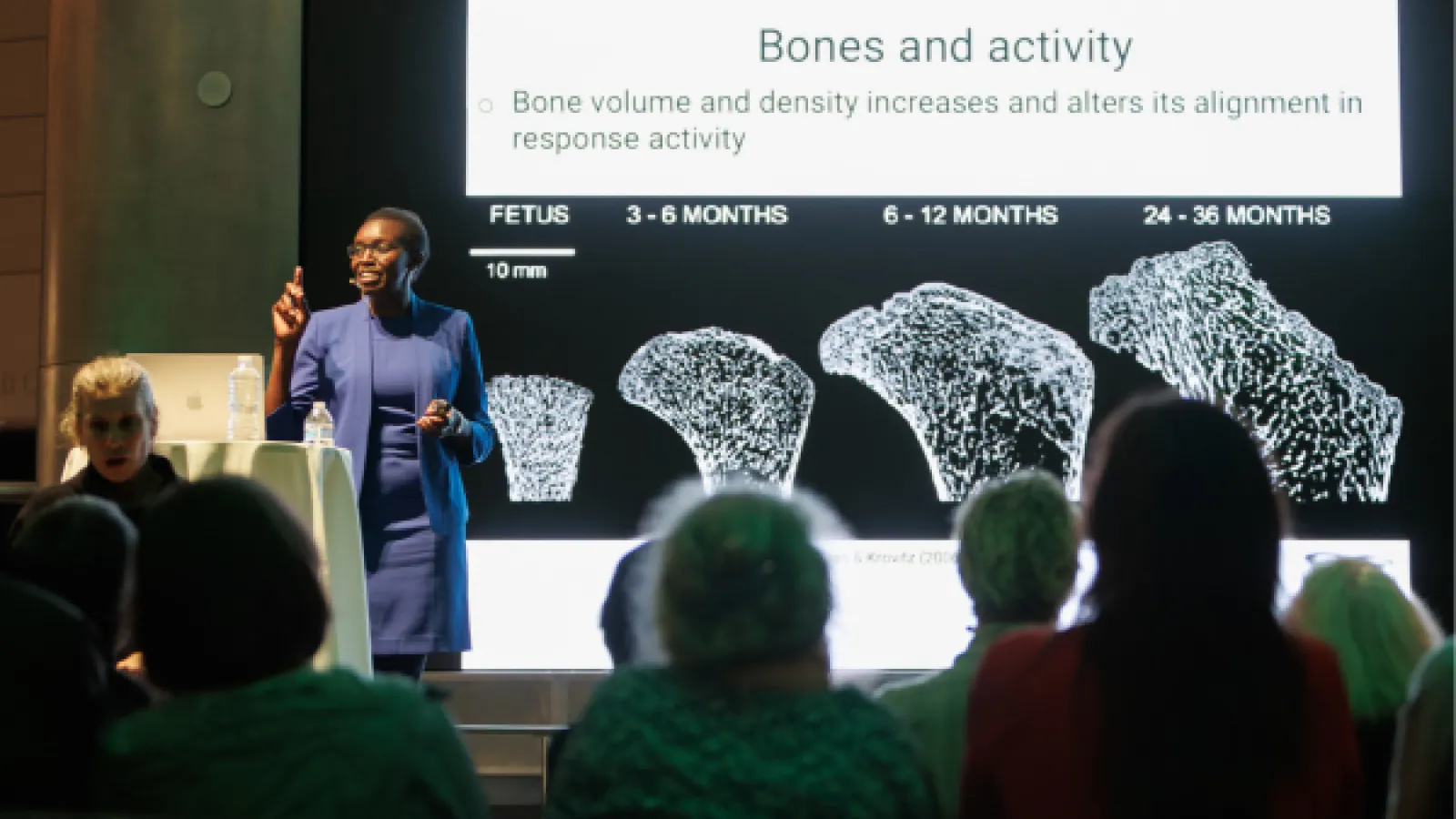 Black woman lecturing an audience