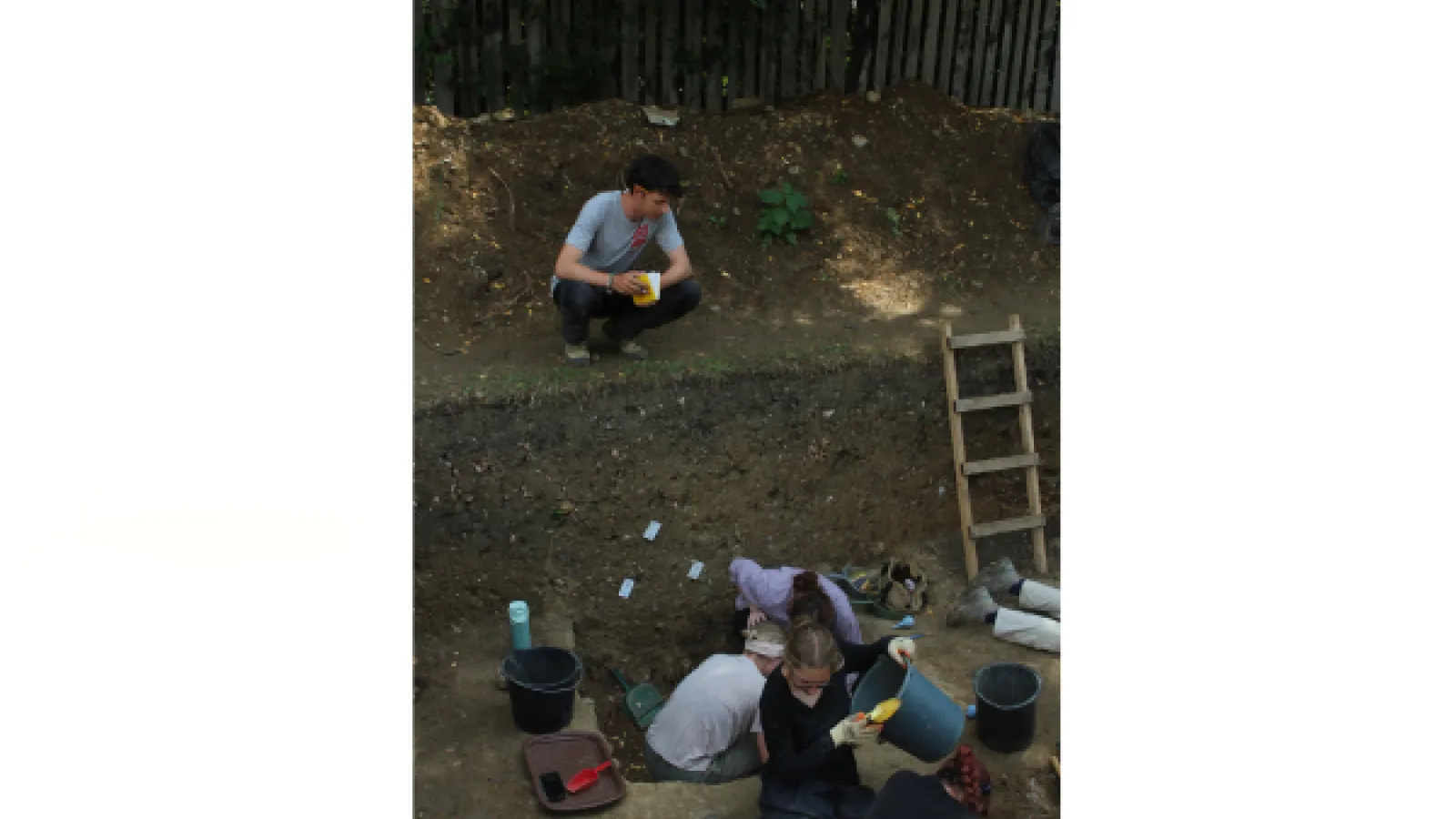Two students working on the excavation of the St. Nicholas site