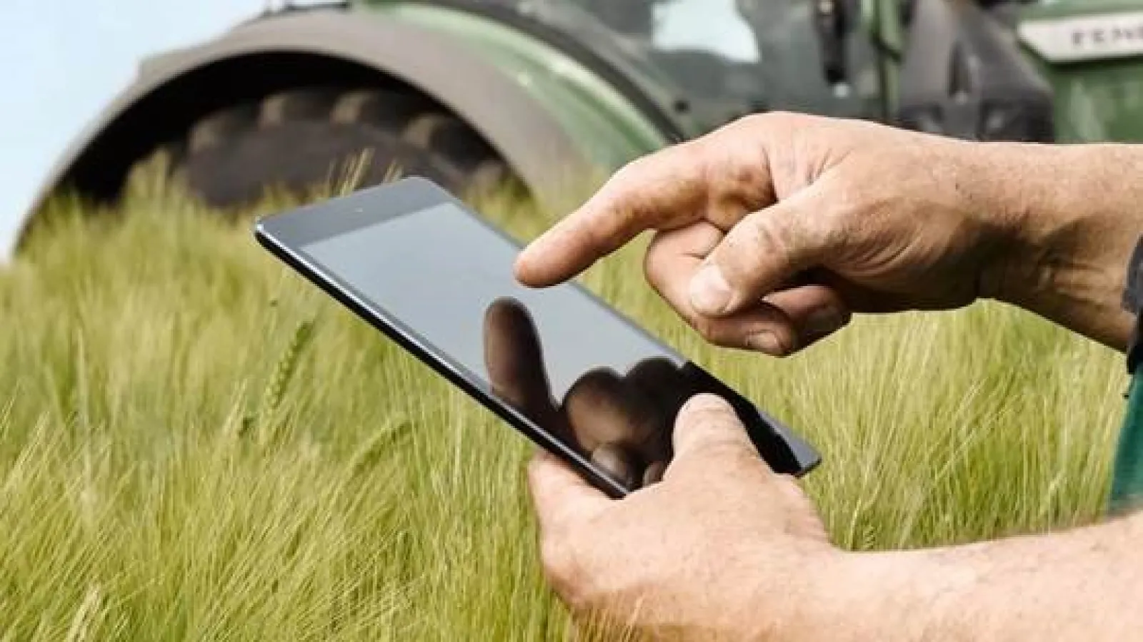 Man using ipad in the field