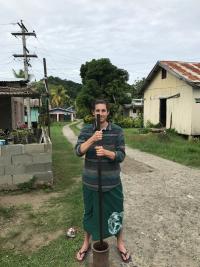 Kyle Riordan pounds kava in Fiji