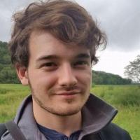 Smiling man with light brown hair