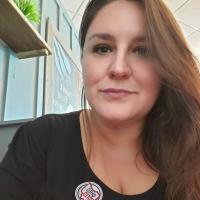 Brunette woman with black blouse