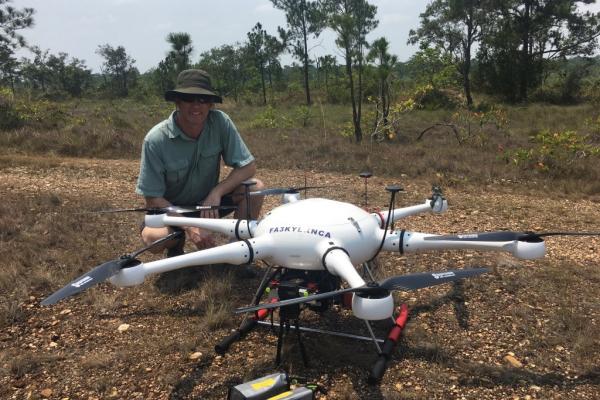 Dr. Sean Downey with the drone used to complete research on swidden fields in Belize