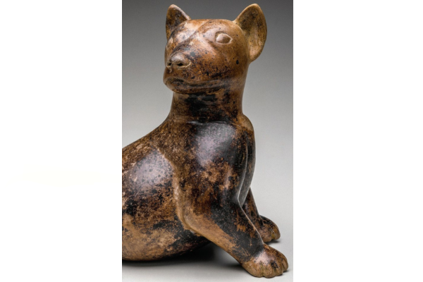 An ancient statue of a dog