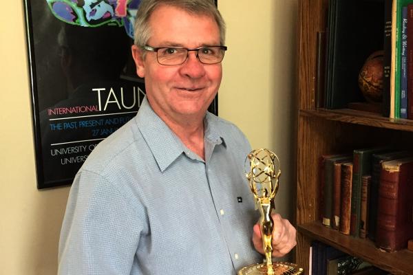 Dr. McKee with Emmy Award