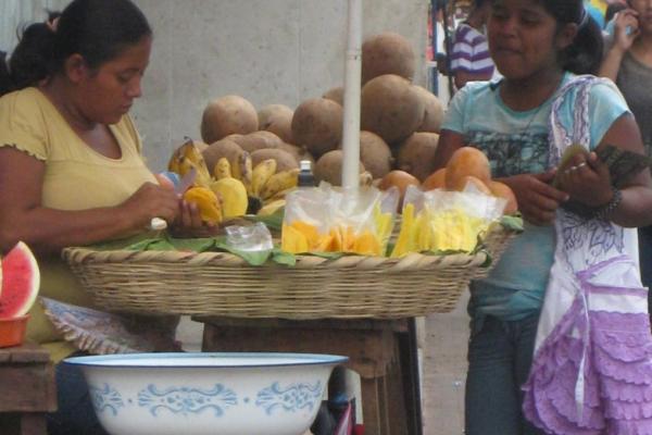 Two women at a market stall