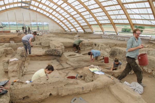 This image shows archaeologists working on an archaeological excavation at Çatalhöyük